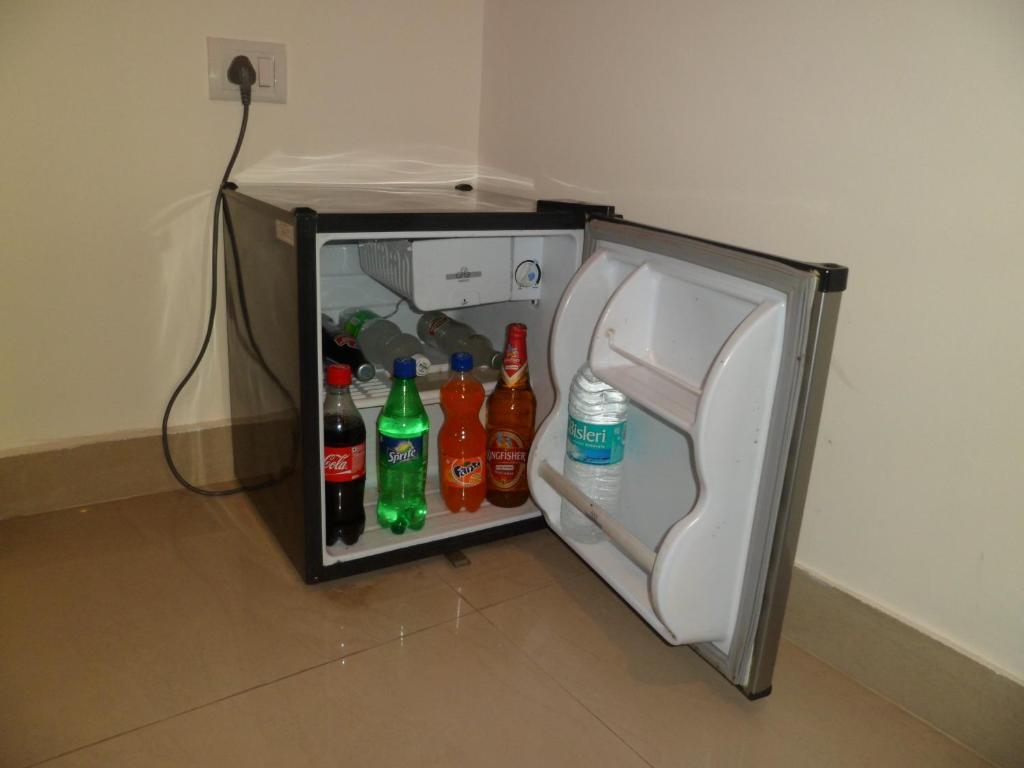 Hotel Arjun Új-Delhi Szoba fotó