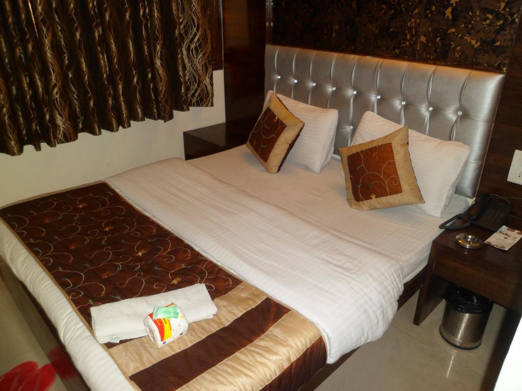 Hotel Arjun Új-Delhi Szoba fotó